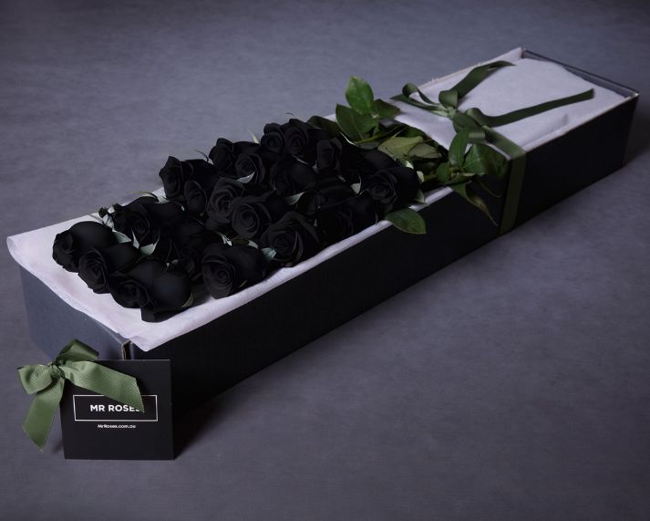 boxed black roses