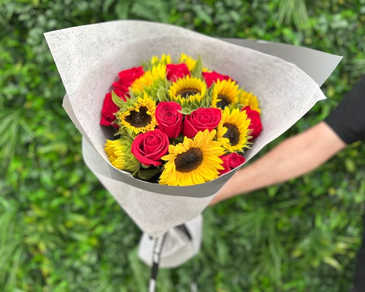 sunflowers and red roses