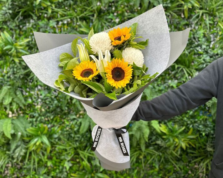 sunflowers, chrysanthemums, and lilies bouque