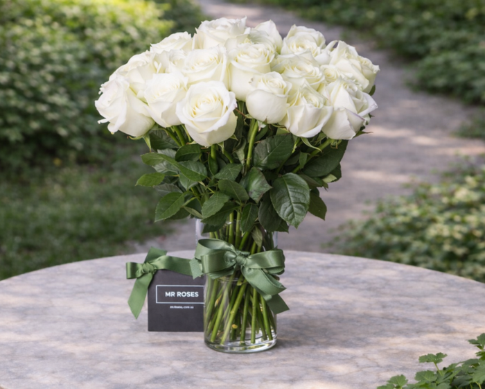 medium stemmed white roses