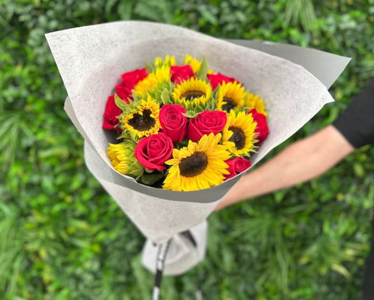 sunflowers and red roses