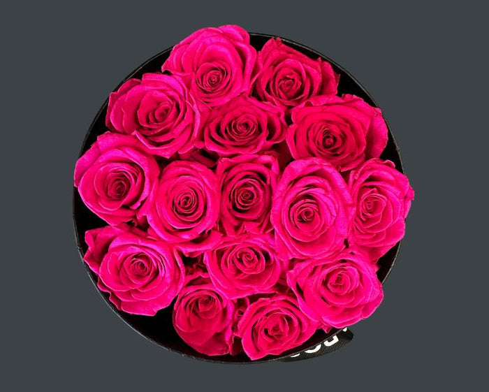 preserved pink roses in hat box