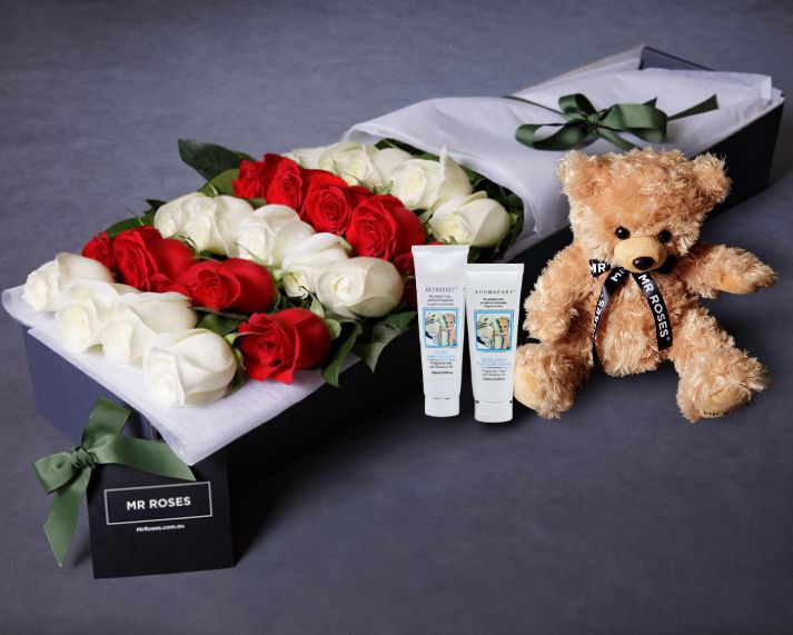 Red Roses, White Roses & Baby Bundle