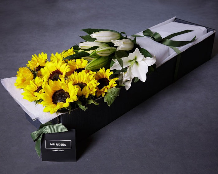 sunflowers and fragrant white lilies flower arrangement in mr roses gift box